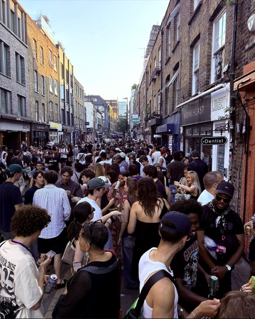A street packed kerb to kerb with people